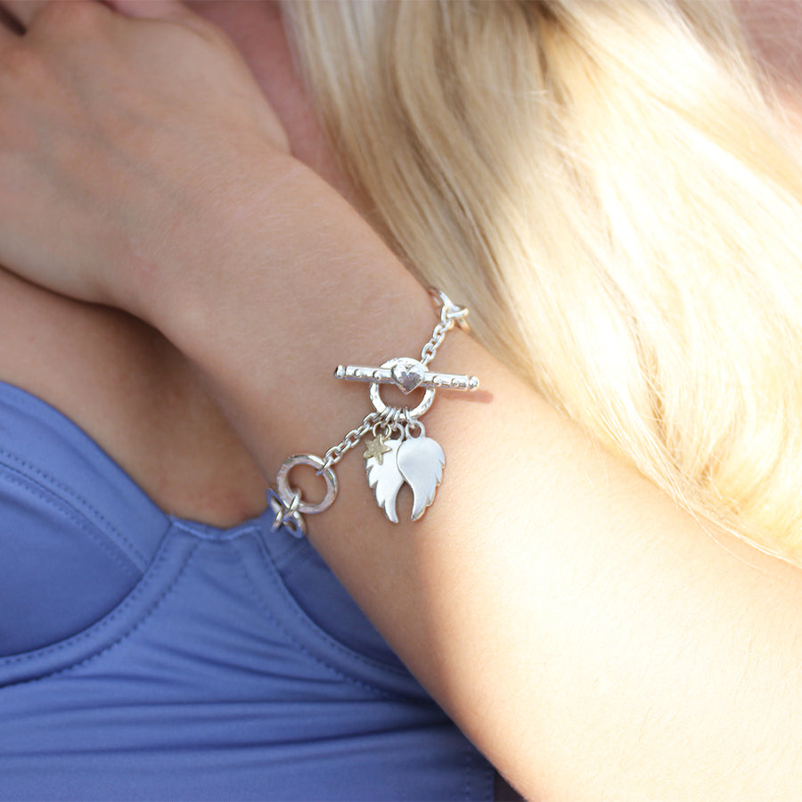 Eva Charm Bracelet With Silver Angel Wings And Gold Star